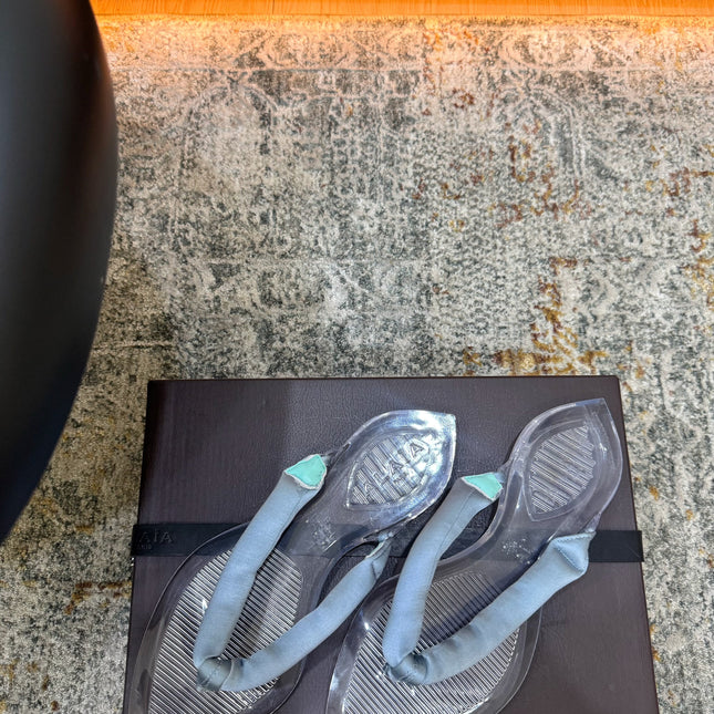 ALAIA 26S THONG SANDALS IN PASTEL BLUE SATIN AND TRANSPARENT PVC