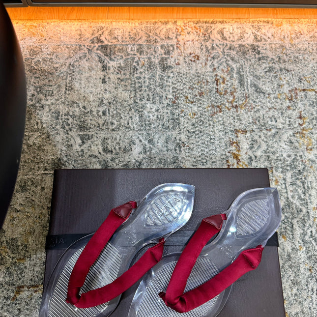 ALAIA 26S THONG SANDALS IN DARK RED SATIN AND TRANSPARENT PVC
