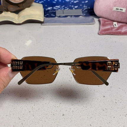 MIUMIU 26S SQUARE FRAME IN METAL 443523