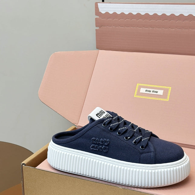 MIUMIU 26S SNEAKER MULES IN NAVY BLUE CANVAS