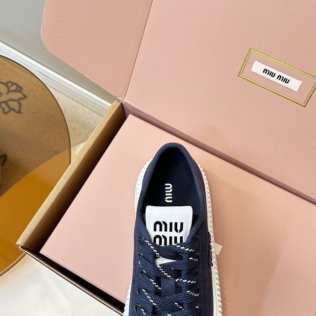 MIUMIU 26S PLATFORM SNEAKERS IN NAVY BLUE CANVAS