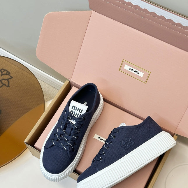 MIUMIU 26S PLATFORM SNEAKERS IN NAVY BLUE CANVAS