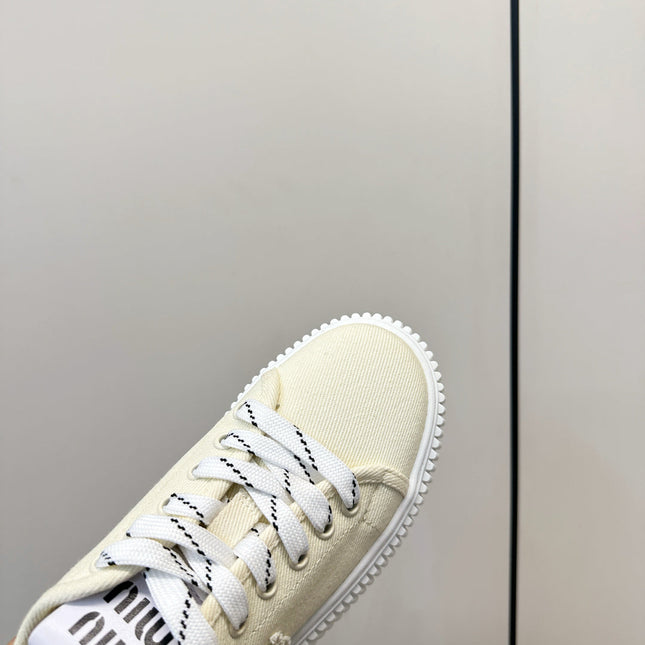 MIUMIU 26S PLATFORM SNEAKERS IN LIGHT YELLOW CANVAS