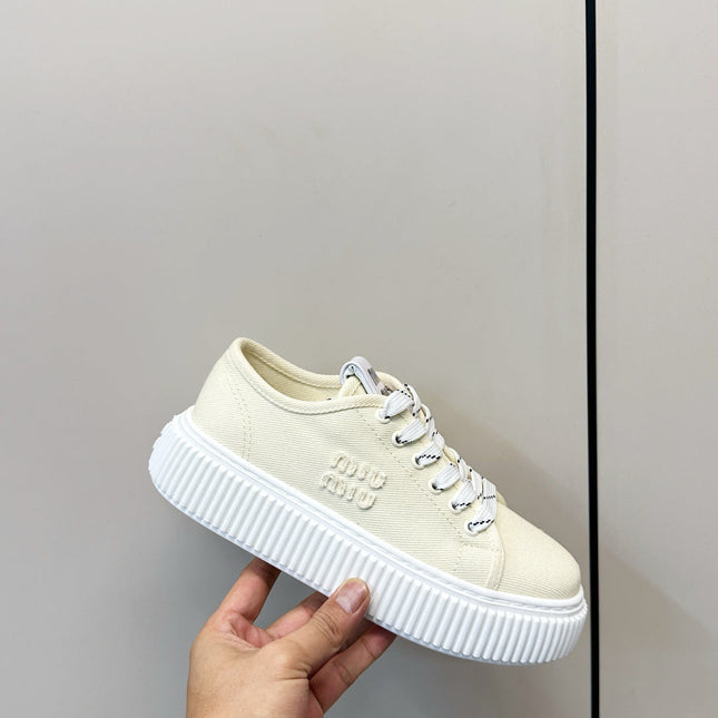 MIUMIU 26S PLATFORM SNEAKERS IN LIGHT YELLOW CANVAS