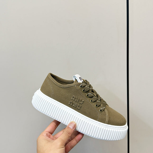 MIUMIU 26S PLATFORM SNEAKERS IN OLIVE GREEN CANVAS