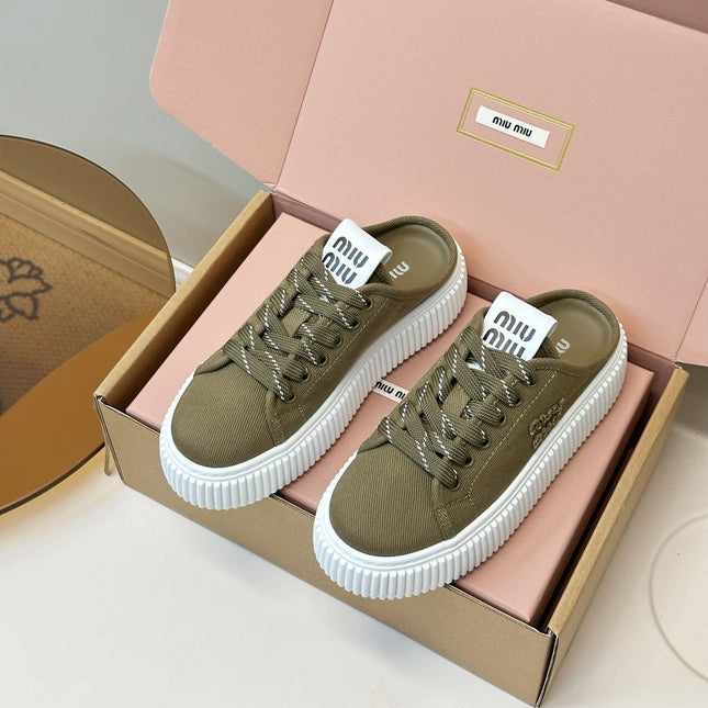 MIUMIU 26S SNEAKER MULES IN OLIVE GREEN CANVAS