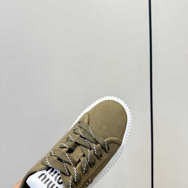 MIUMIU 26S PLATFORM SNEAKERS IN OLIVE GREEN CANVAS