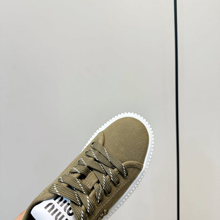 MIUMIU 26S PLATFORM SNEAKERS IN OLIVE GREEN CANVAS