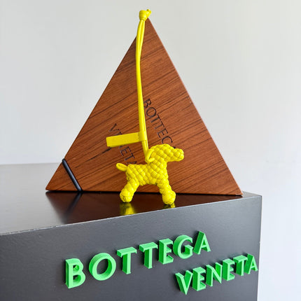 BOTTEGA VENETA 25S DOG CHARM IN LEMON YELLOW CALFSKIN