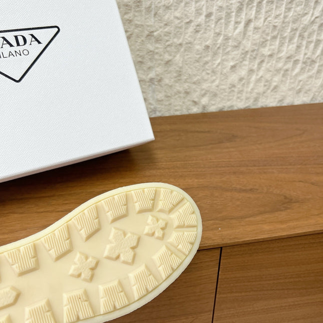 PRADA 25S PLATFORM FUR-LINED MULES IN BLACK SUEDE