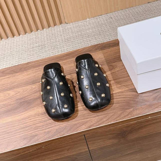 CHLOE 26S STUDDED FLAT MULES IN BLACK CALFSKIN