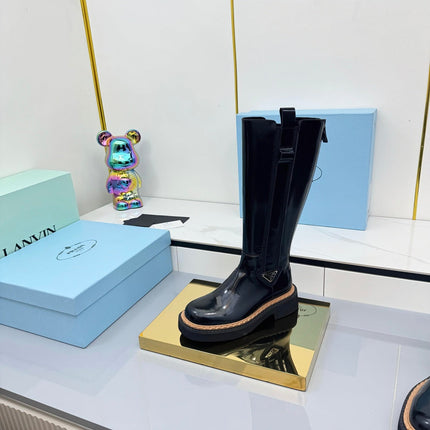 PRADA 25S TALL CHELSEA BOOTS 50MM IN BLACK GLOSSY CALFSKIN