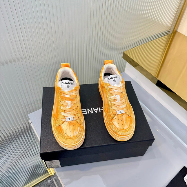 CHANEL 26S LOW-TOP SNEAKERS IN GOLDEN ORANGE CALFSKIN