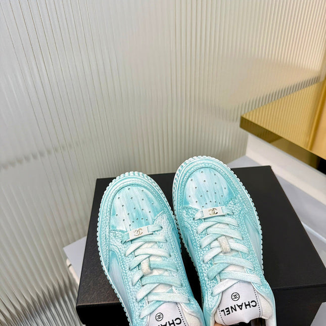 CHANEL 26S LOW-TOP SNEAKERS IN LIGHT MINT BLUE GRAFFITI PATTERN CALFSKIN