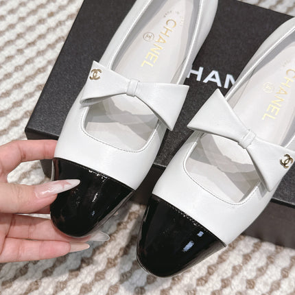 CHANEL 25S MARY JANE BALLET FLATS IN WHITE LAMBSKIN BLACK PATENT CAP TOE WITH BOW
