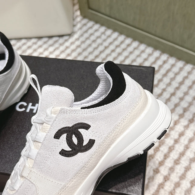CHANEL 25S LUXURY SNEAKERS IN WHITE CALFSKIN AND SUEDE