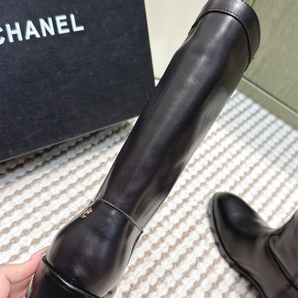 CHANEL 25S MID-CALF BOOTS IN BLACK CALFSKIN