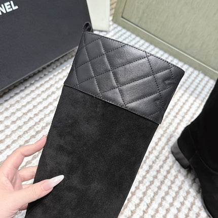 CHANEL 25S HIGH-CALF COWBOY BOOTS IN BLACK SUEDE AND CALFSKIN DIAMOND-QUILTED