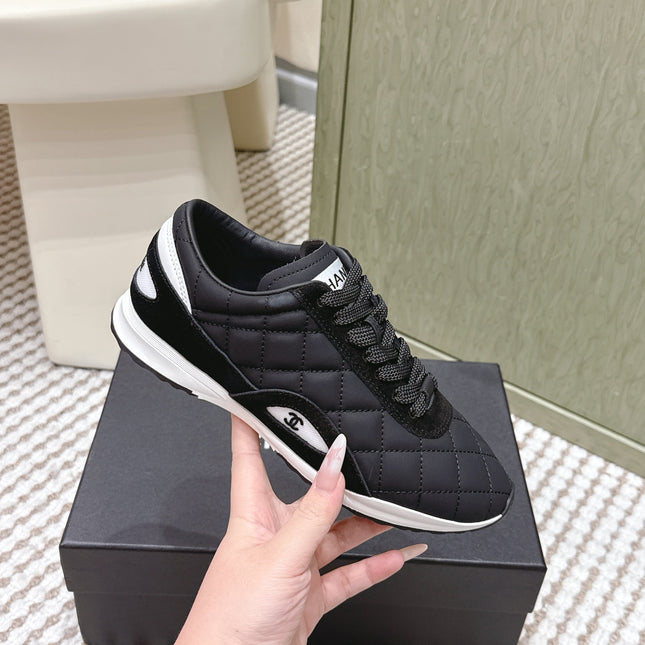 CHANEL 25S SNEAKERS IN BLACK CALFSKIN AND SUEDE