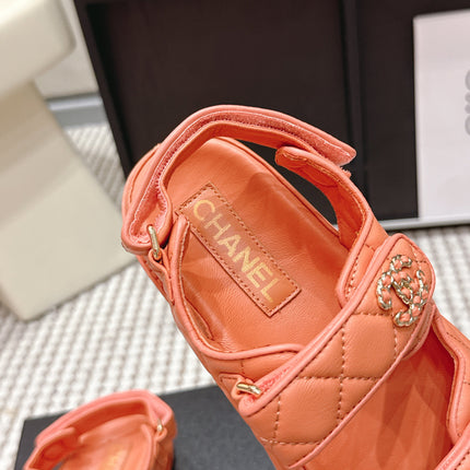 CHANEL 26S QUILTED DAD SANDALS IN ORANGE CALFSKIN