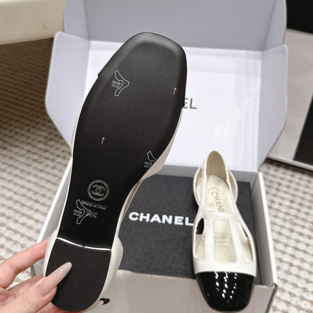 CHANEL 26S ROUND TOE MARY JANE FLATS IN OFF WHITE CUTOUT CALFSKIN WITH BLACK PATENT TOE