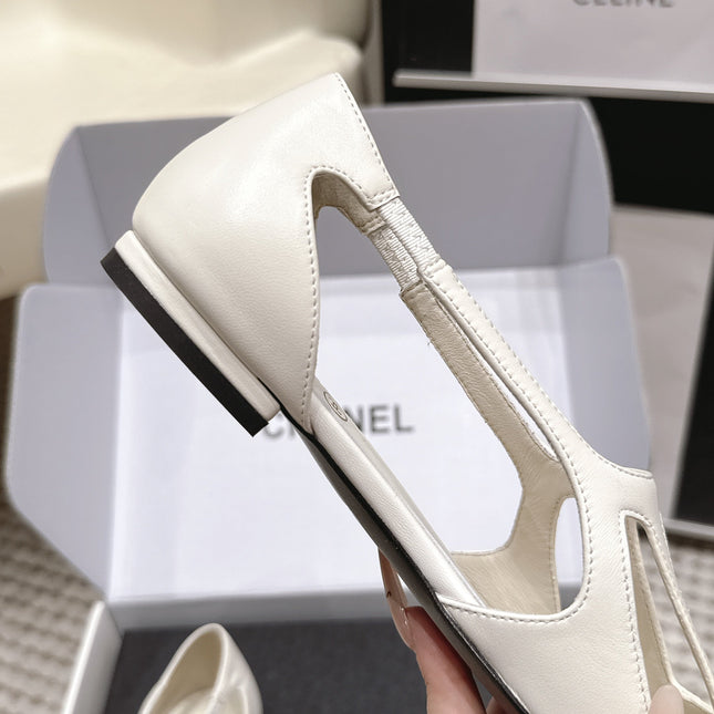 CHANEL 26S ROUND TOE MARY JANE FLATS IN OFF WHITE CUTOUT CALFSKIN WITH BLACK PATENT TOE