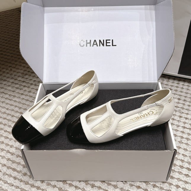 CHANEL 26S ROUND TOE MARY JANE FLATS IN OFF WHITE CUTOUT CALFSKIN WITH BLACK PATENT TOE
