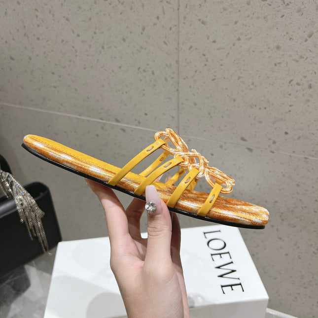 LOEWE 26S BRAIDED CAGE SLIDE SANDALS IN YELLOW CALFSKIN