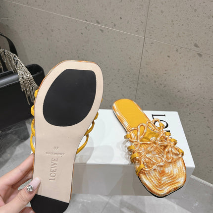 LOEWE 26S BRAIDED CAGE SLIDE SANDALS IN YELLOW CALFSKIN