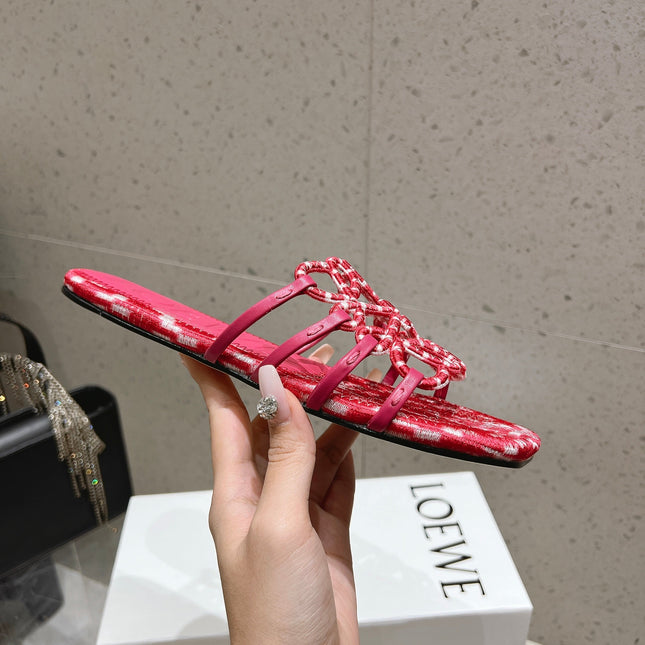 LOEWE 26S BRAIDED CAGE SLIDE SANDALS IN CORAL PINK CALFSKIN