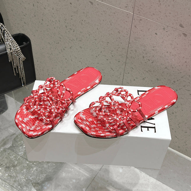 LOEWE 26S BRAIDED CAGE SLIDE SANDALS IN CORAL PINK CALFSKIN