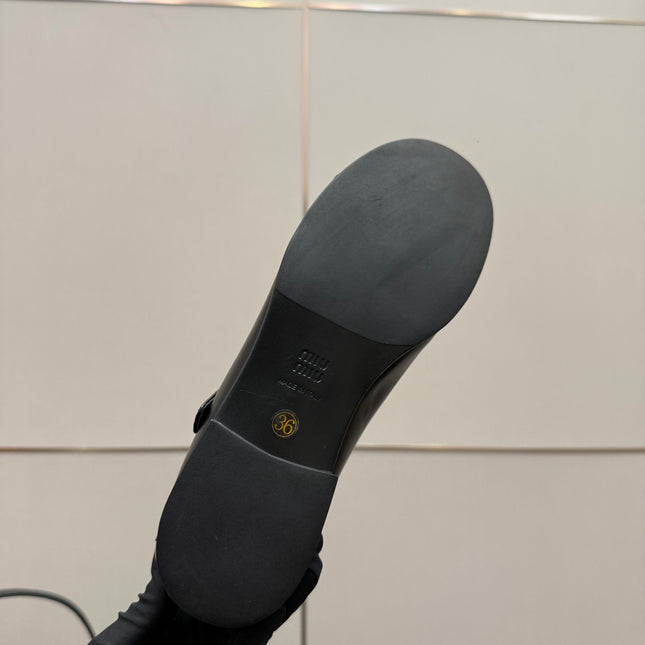 MIUMIU 25S LOAFERS WITH STRAP IN BLACK LAMBSKIN