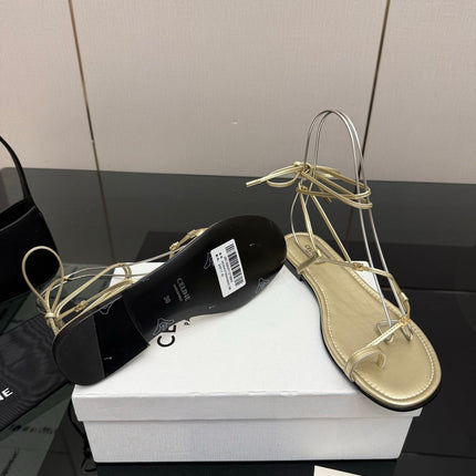 CELINE 26S TRIOMPHE LACE UP FLAT SANDALS IN GOLD CALFSKIN