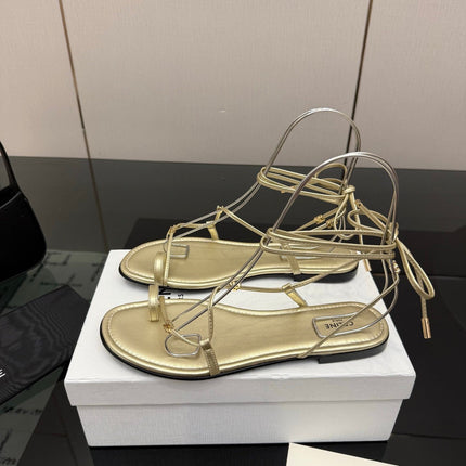 CELINE 26S TRIOMPHE LACE UP FLAT SANDALS IN GOLD CALFSKIN