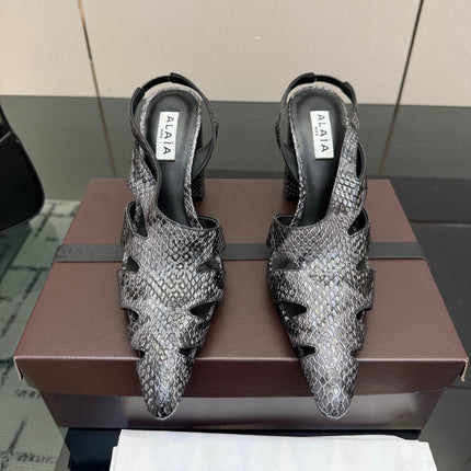 ALAIA 26S HEELED SLINGBACKS IN BLACK PYTHON-EMBOSSED LEATHER