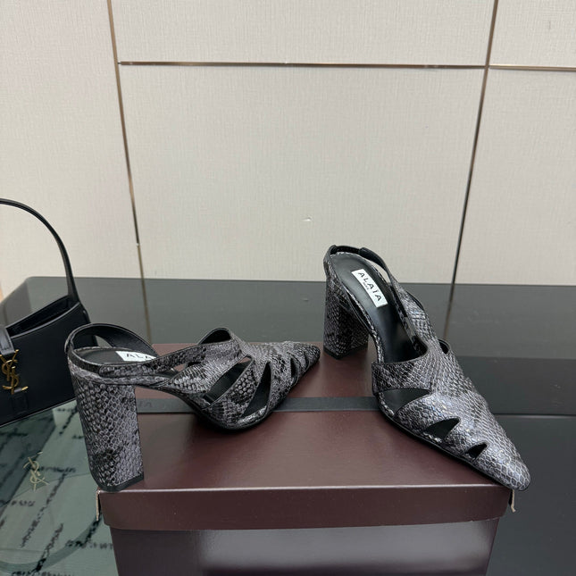 ALAIA 26S HEELED SLINGBACKS IN BLACK PYTHON-EMBOSSED LEATHER
