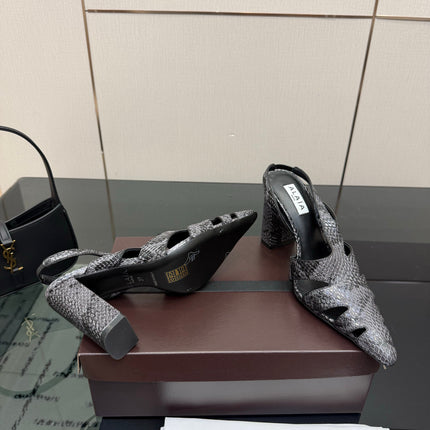 ALAIA 26S HEELED SLINGBACKS IN BLACK PYTHON-EMBOSSED LEATHER
