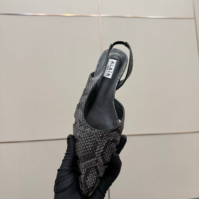 ALAIA 26S CUT-OUT SLINGBACK FLATS IN BLACK PYTHON-EMBOSSED LEATHER