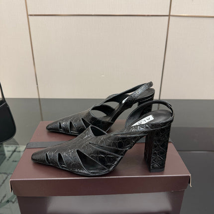 ALAIA 26S HEELED SLINGBACKS IN BLACK CROC-EMBOSSED LEATHER