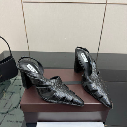 ALAIA 26S HEELED SLINGBACKS IN BLACK CROC-EMBOSSED LEATHER
