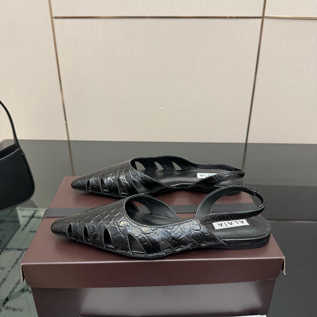 ALAIA 26S CUT-OUT SLINGBACK FLATS IN BLACK CROC-EMBOSSED LEATHER