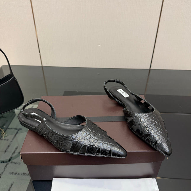 ALAIA 26S CUT-OUT SLINGBACK FLATS IN BLACK CROC-EMBOSSED LEATHER