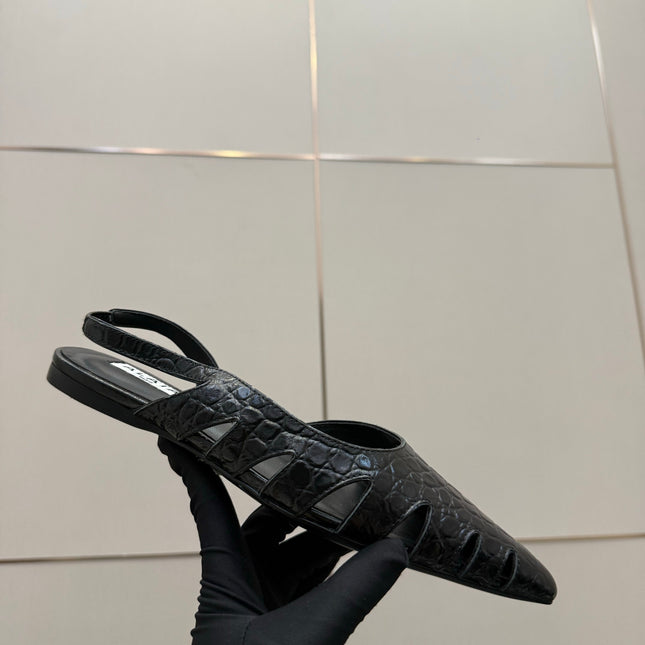 ALAIA 26S CUT-OUT SLINGBACK FLATS IN BLACK CROC-EMBOSSED LEATHER