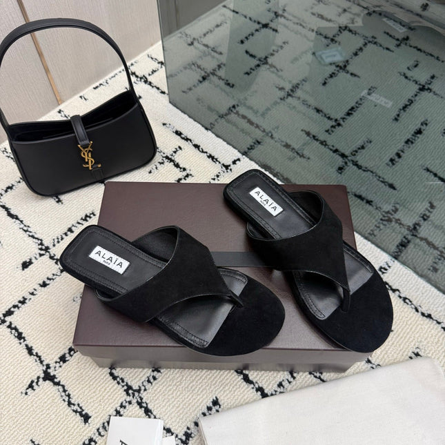 ALAIA 26S THONG MULE SANDALS IN BLACK SUEDE