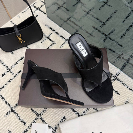 ALAIA 26S HEELED THONG MULE SANDALS IN BLACK SUEDE