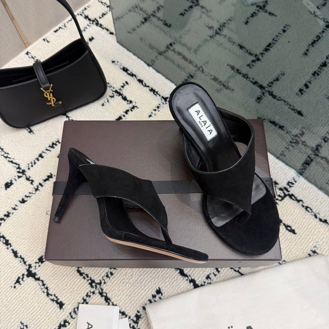 ALAIA 26S HEELED THONG MULE SANDALS IN BLACK SUEDE