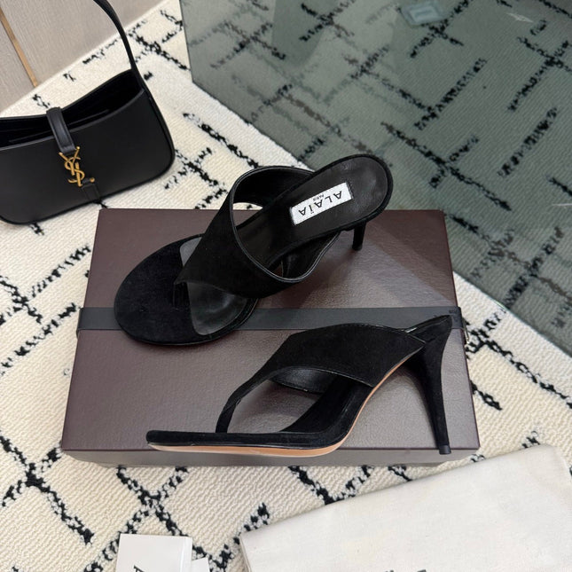 ALAIA 26S HEELED THONG MULE SANDALS IN BLACK SUEDE