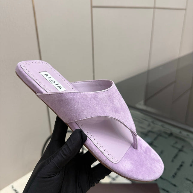 ALAIA 26S THONG MULE SANDALS IN PURPLE SUEDE