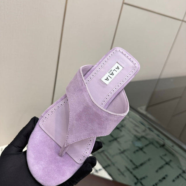 ALAIA 26S THONG MULE SANDALS IN PURPLE SUEDE