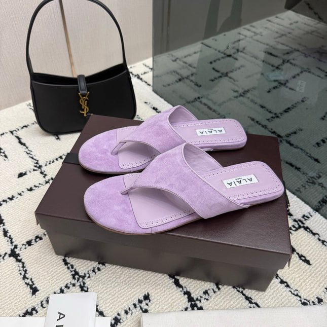 ALAIA 26S THONG MULE SANDALS IN PURPLE SUEDE